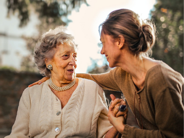 older person and helper