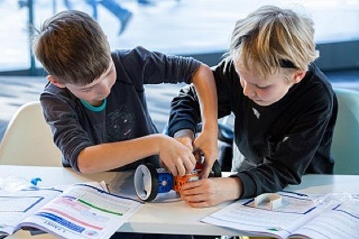 two children in a classroom image